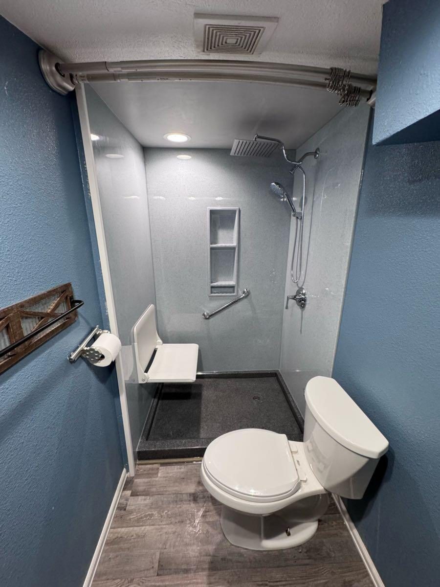 Bathroom after remodel with new walk-in shower