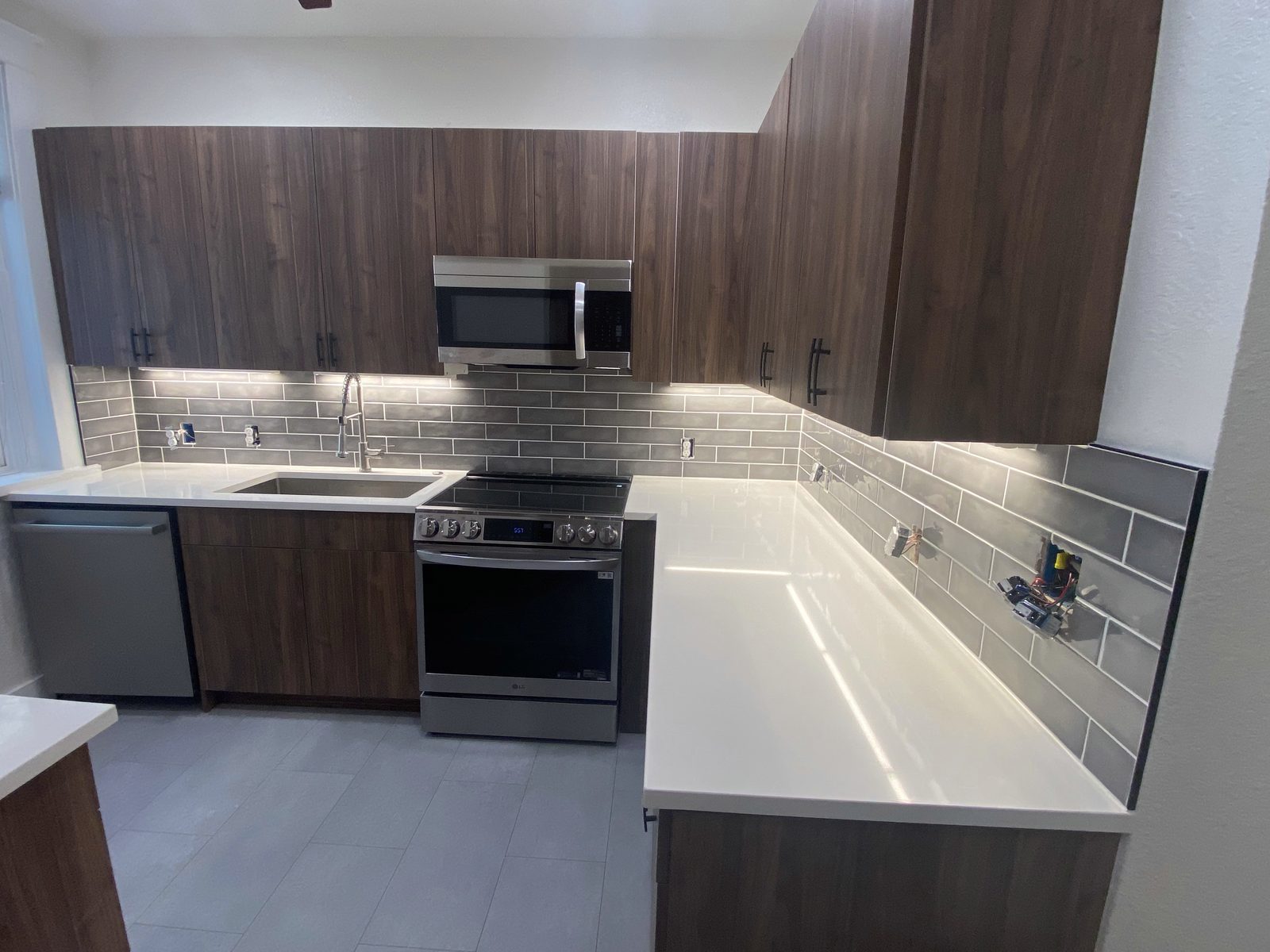 Full kitchen remodel in Aurora, CO with new cabinets and stainless appliances by Hire-A-Handyman LLC